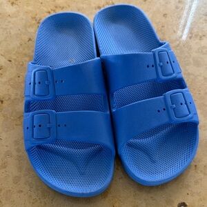 Freedom Moses women’s  Blue Slide Sandals